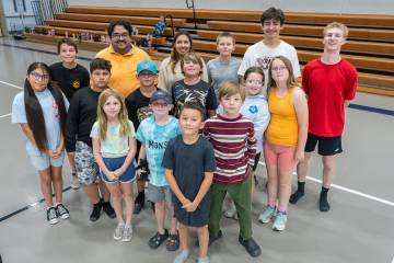 Pahrump Valley Youth Activities summer program participants take a break from their soccer game ...