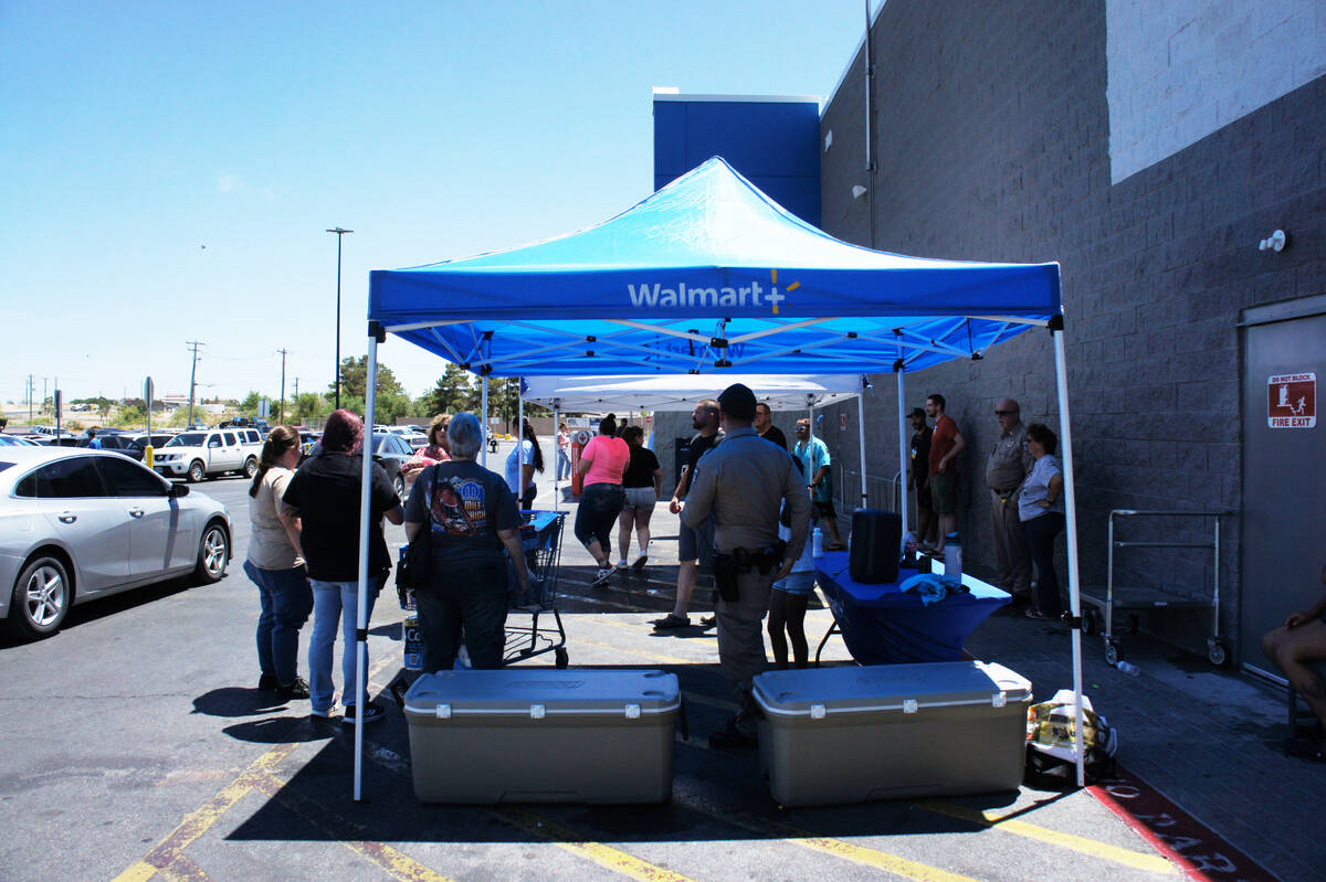 Many Walmart shoppers stopped by the event to donate and throw water balloons. (Elijah Dulay/Pa ...