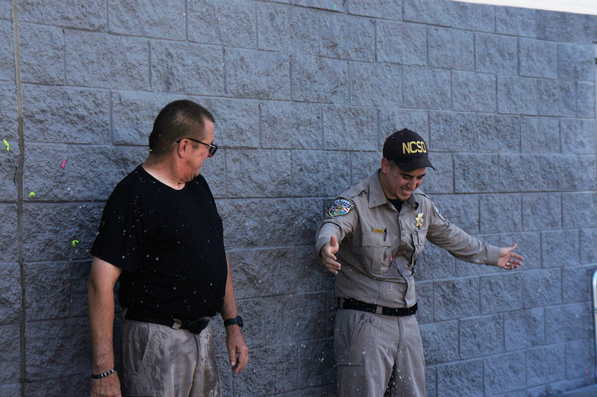 Water balloons were available for $1. Participants could throw water balloons at Walmart staff, ...