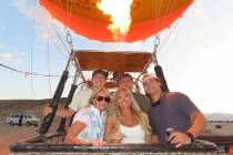 Brant Kairit and his family pose for a photo before their hot air balloon ride near Pahrump on ...