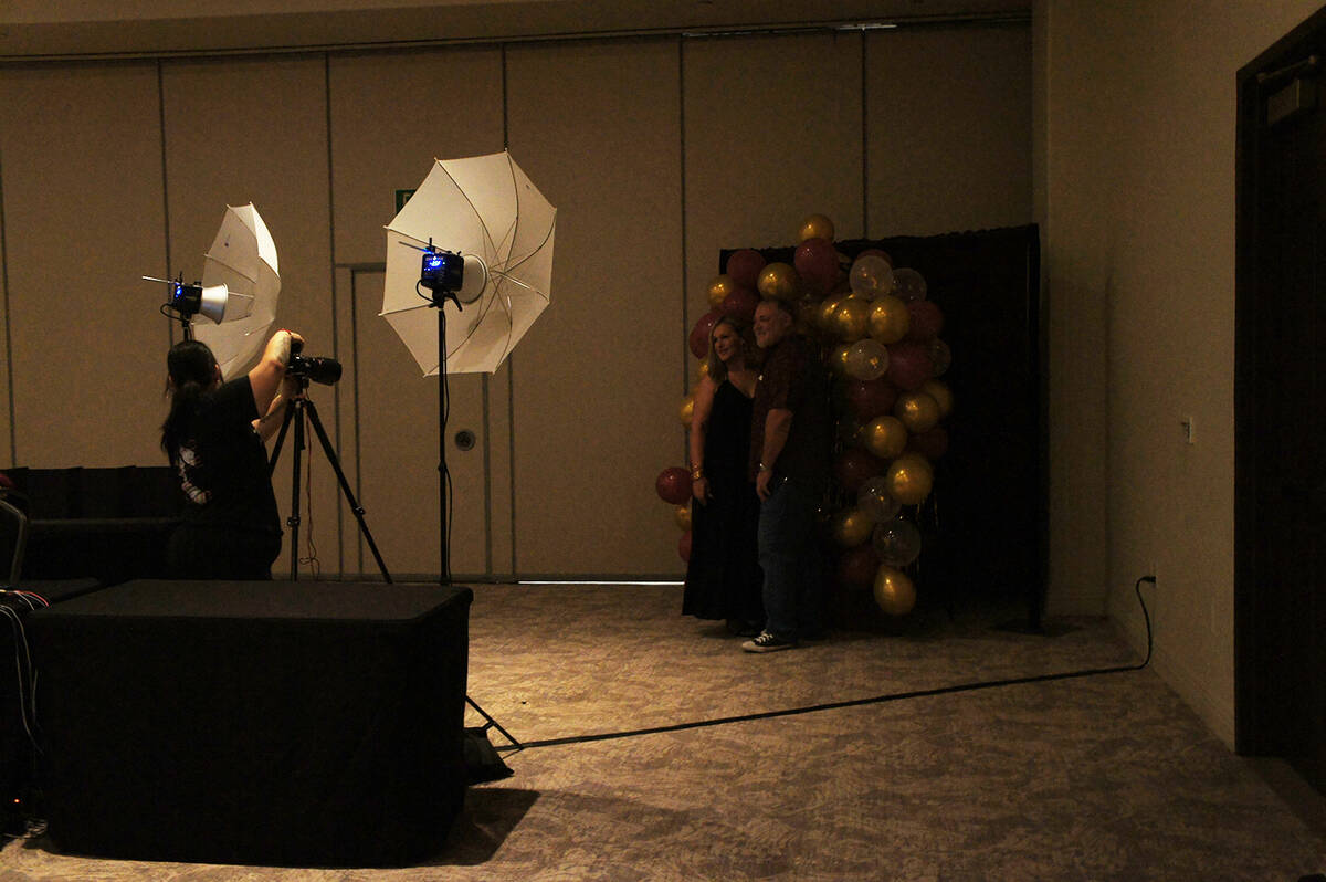 As attendees entered the reunion in Las Vegas, they had the opportunity to have pictures taken ...