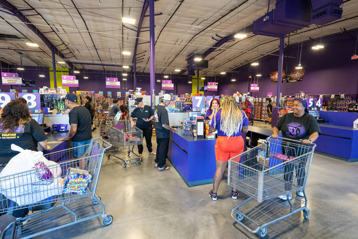 Shoppers at Phantom Fireworks in Pahrump purchase fireworks at the store's checkout area. (John ...