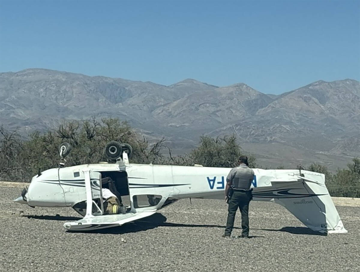 A small plane flipped over after a landing at Furnace Creek Airport in Death Valley National Pa ...