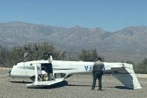 A small plane flipped over after a landing at Furnace Creek Airport in Death Valley National Pa ...