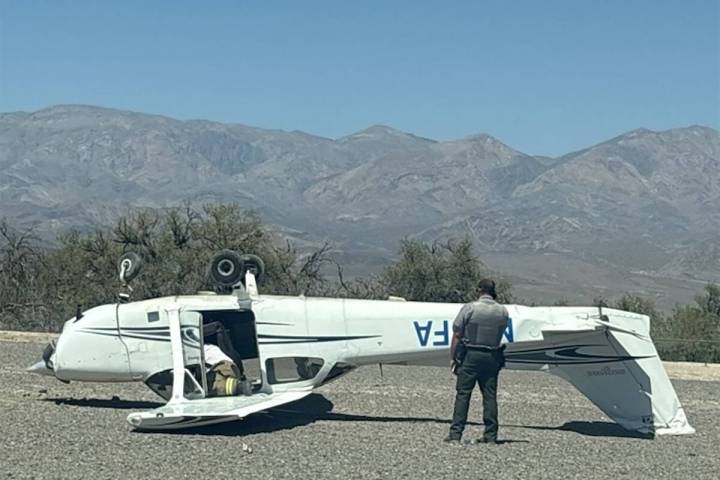 A small plane flipped over after a landing at Furnace Creek Airport in Death Valley National Pa ...