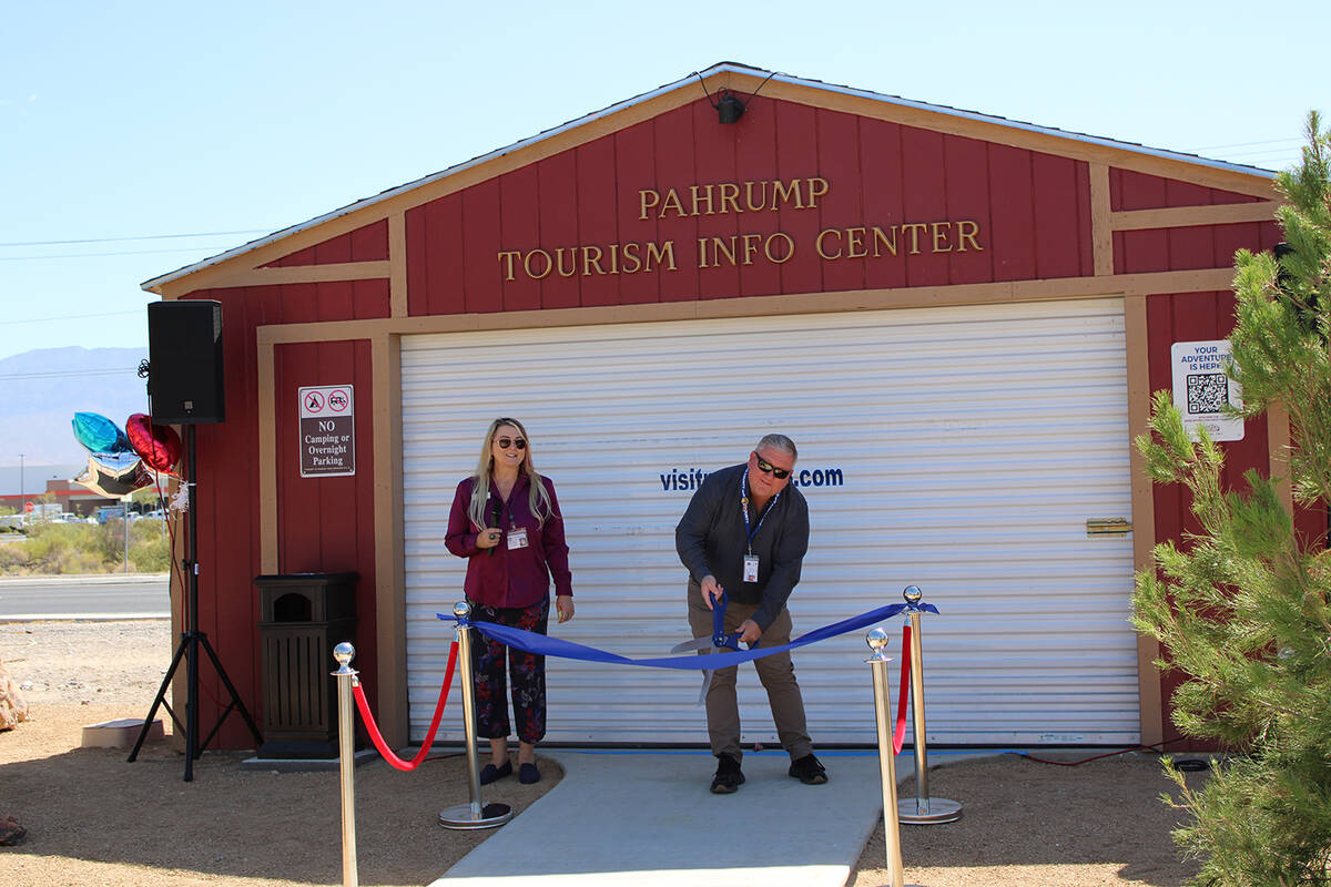 Pahrump Tourism Director Jaynee Reeves, left, stands beside Nye County and town of Pahrump Mana ...