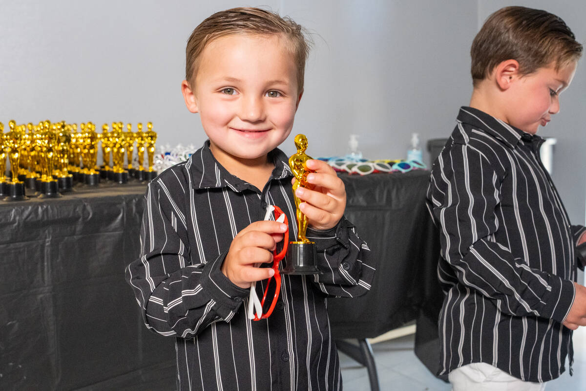 A youngster receives his “Oscar” as he enters the event. (John Clausen/Pahrump Valley Times)