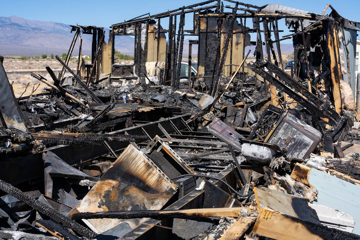 Few of the home's main structural attributes remain. A burned bed frame and kitchen appliances ...