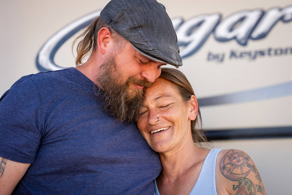 Jacob Pennell (left) and his wife Nikki (right). The Pennell family is staying with their next- ...