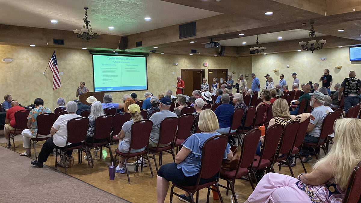Residents line up to speak at the public hearing on the MediWaste Disposal LLC proposal, tellin ...