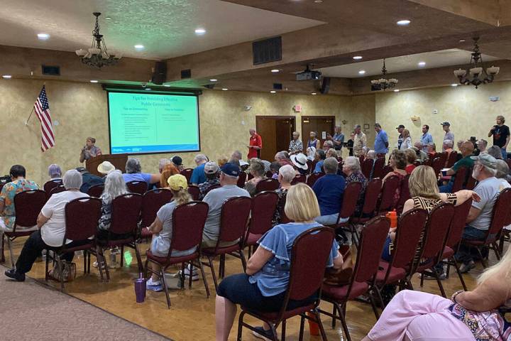 Residents line up to speak at the public hearing on the MediWaste Disposal LLC proposal, tellin ...