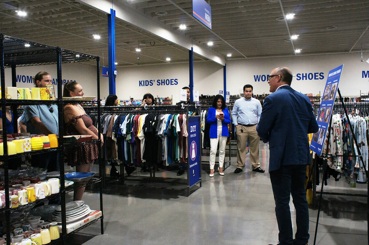 Goodwill of Southern Nevada Chief of Marketing and External Relations Bryan Stewart (right) giv ...
