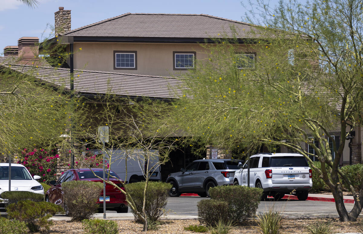 A Clark County Coroner vehicle is seen at Advanced Health Care of Las Vegas, where police were ...