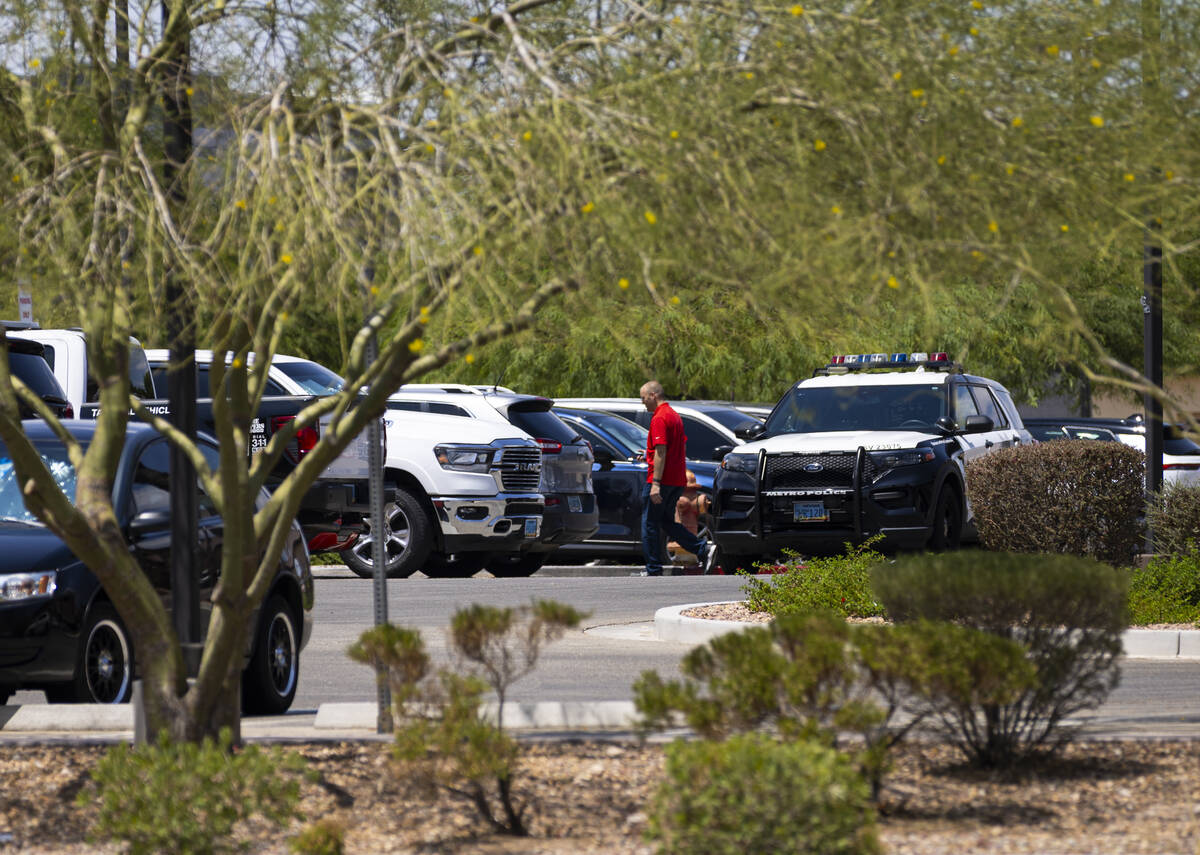 A Metropolitan Police Department vehicle is seen at Advanced Health Care of Las Vegas, where po ...