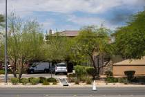 A Clark County Coroner vehicle is seen at Advanced Health Care of Las Vegas, where police were ...