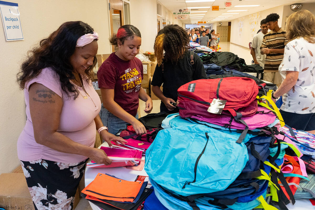 Over 700 backpacks were distributed to students at this year's Back to School Fair. (John Claus ...