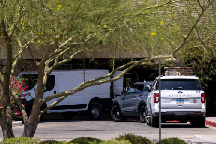 A Clark County Coroner vehicle is seen at Advanced Health Care of Las Vegas, where police were ...