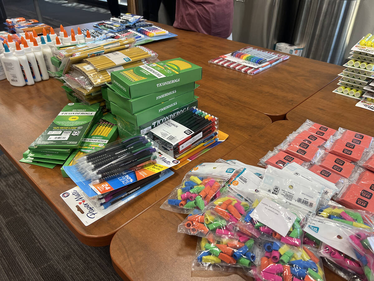 All of the items collected during the Fill the Bucket Truck School Supply Drive are separated i ...
