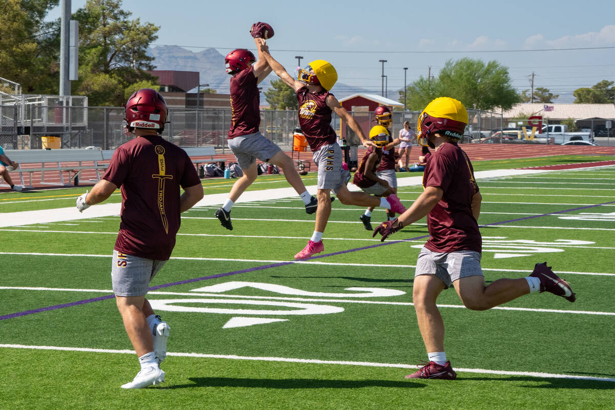Senior tight end Paul Walker, the Trojans’ 2025 Defensive Lineman of the Year, reaches for a ...