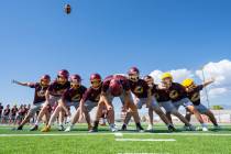 The Trojans' field-goal unit works through a kicking drill during football practice, Aug. 5. (J ...
