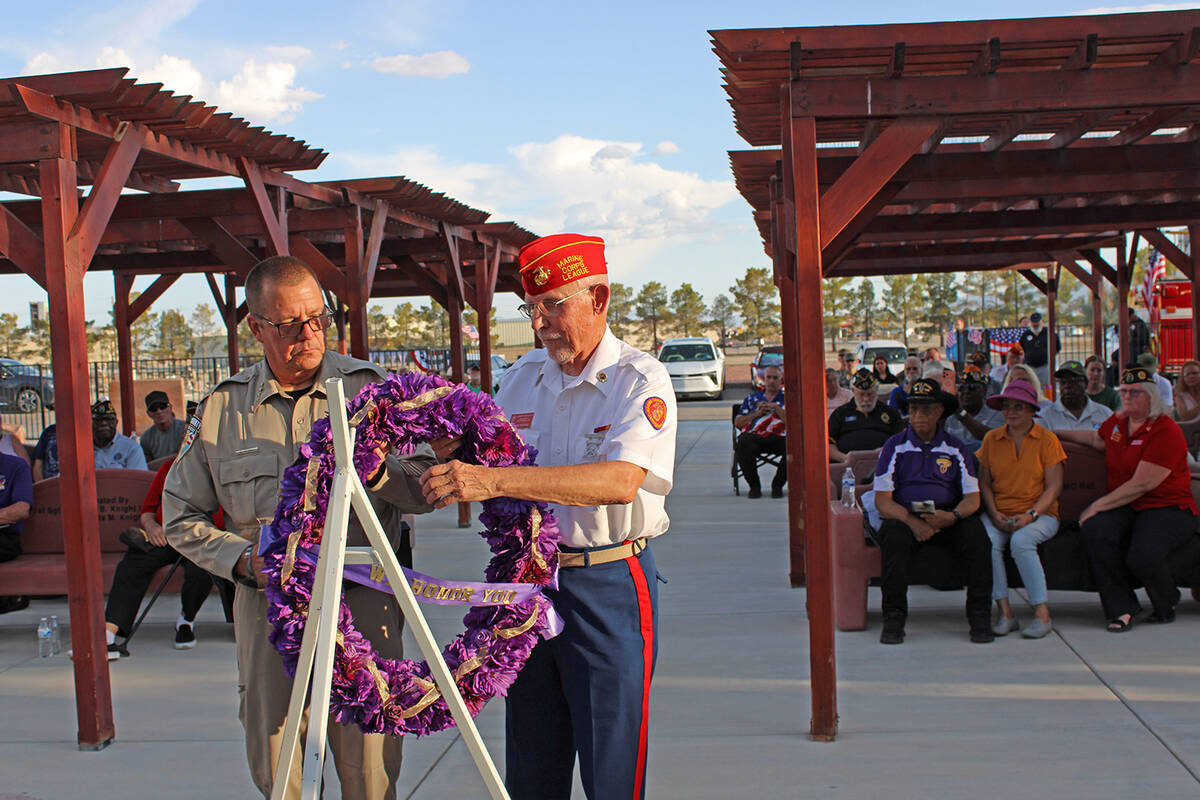 Nye County Sheriff Joe McGill and veteran Steven Watkins conducted the wreath ceremony at this ...
