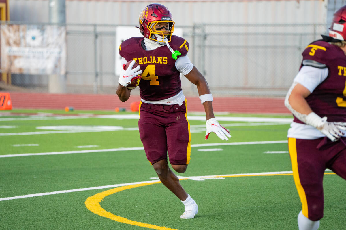 Iyan Bosket looks for running room against Providence Hall during Pahrump Valley’s 29-6 seaso ...