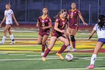 Pahrump Valley’s Sydney Crotty works through The Meadows defense during a home league match l ...