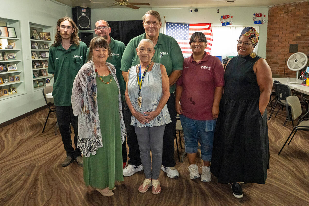 MLK Scholarship Foundation board members Kathleen O'Connor, front row left, and Saundra Fisher, ...