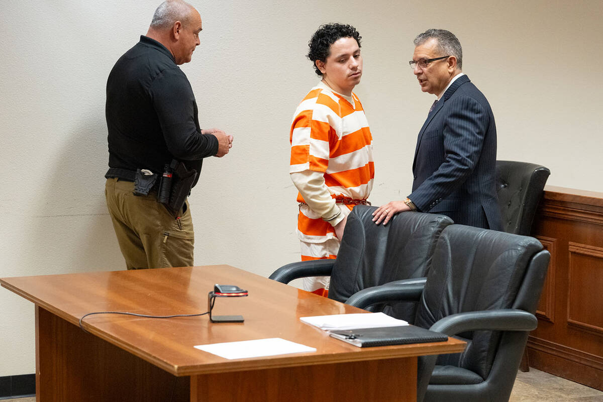 Anthony Aguilar (center) enters the Pahrump Department 1 courtroom in Fifth Judicial District C ...