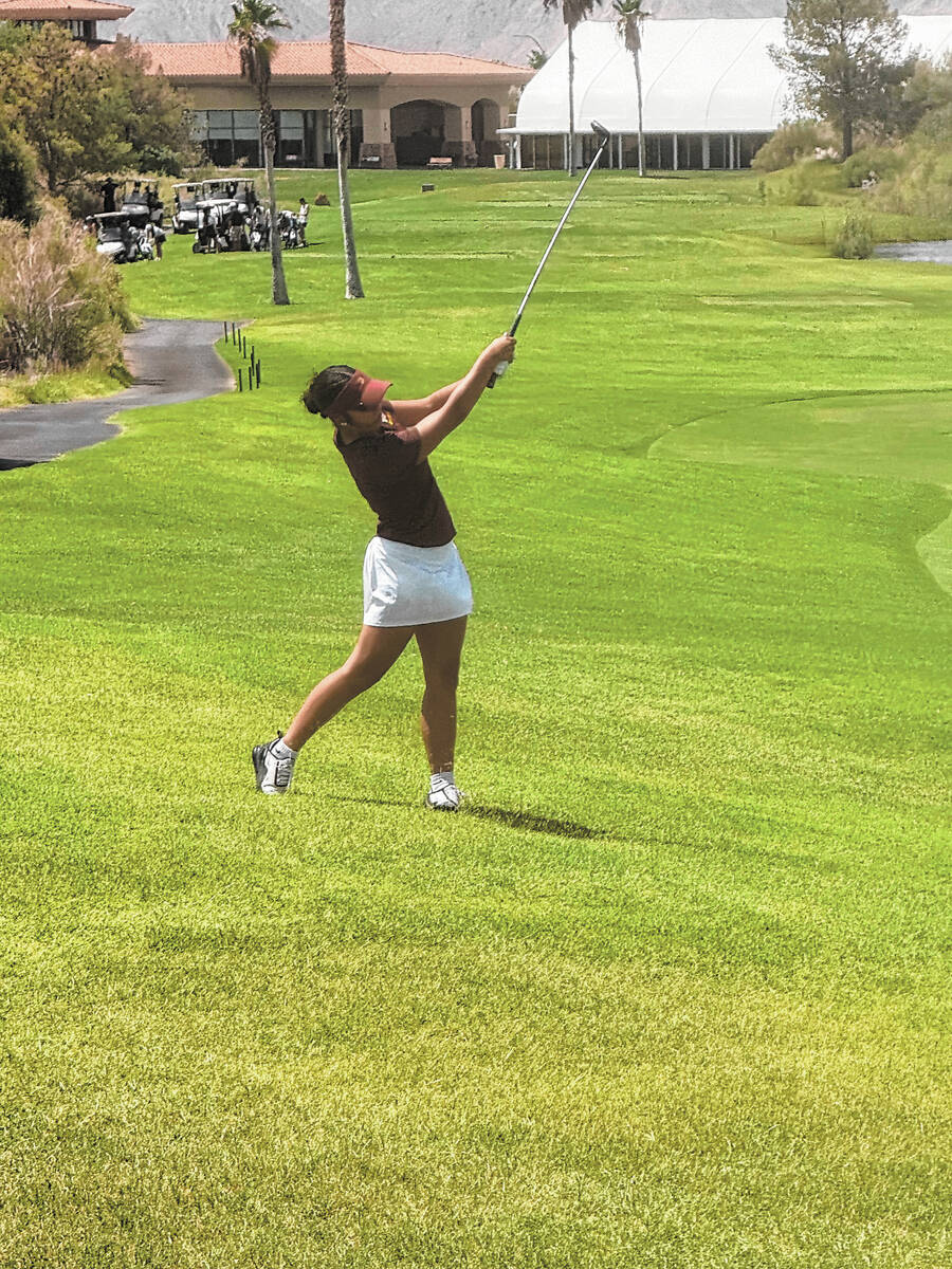 Pahrump Valley senior Natalie Soto follows through on a shot during the Trojans’ season-openi ...