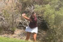 Pahrump Valley sophomore Raegan Saldana hits from the rough during the season-opening Class 3A ...