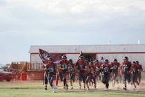 Duffy Otteson/Special to the Times-Bonanza Tonopah High School players take the field before Fr ...