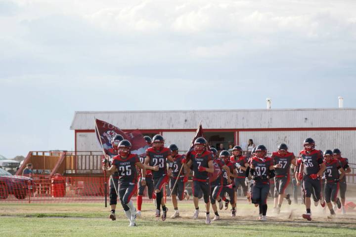 Duffy Otteson/Special to the Times-Bonanza Tonopah High School players take the field before Fr ...