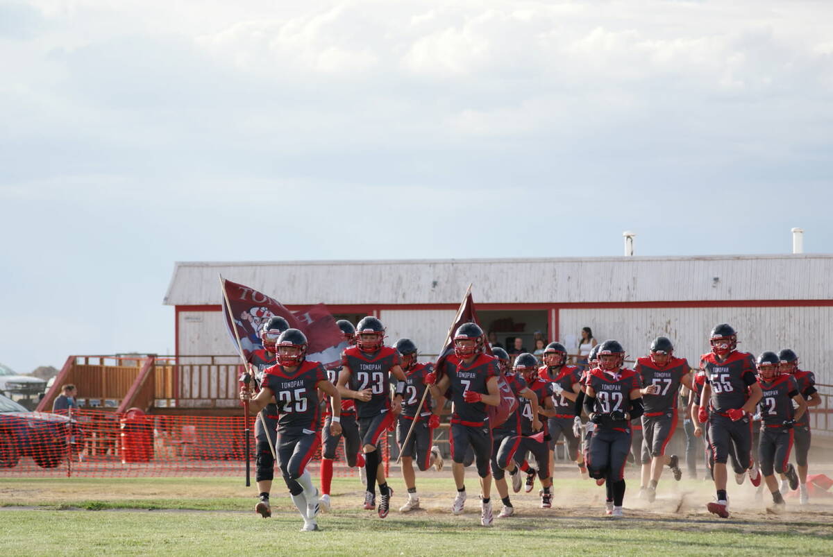 Duffy Otteson/Special to the Times-Bonanza Tonopah High School players take the field before Fr ...