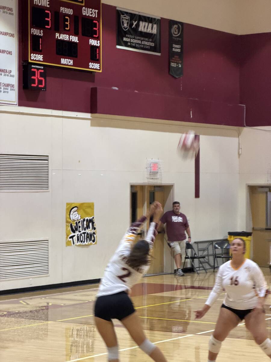Pahrump Valley’s Alyvia Morin (2) plays the ball as teammate Evalenne Armendariz (16) moves i ...
