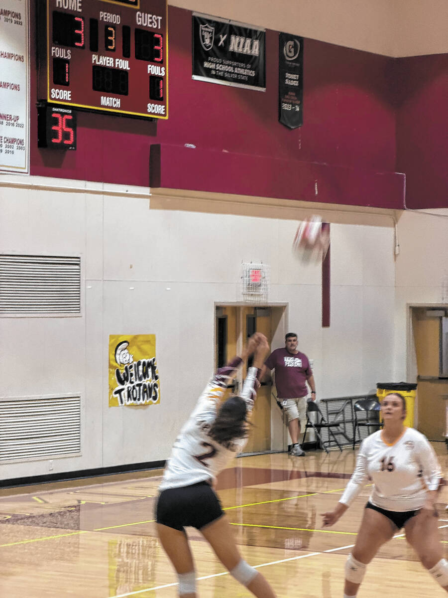 Pahrump Valley’s Alyvia Morin (2) plays the ball as teammate Evalenne Armendariz (16) moves i ...