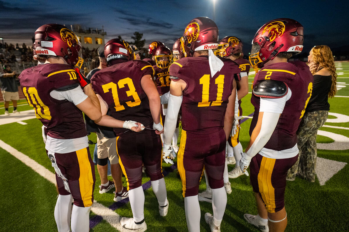 Pahrump Valley players gather on the sideline during their game against Galena on Friday, Aug. ...