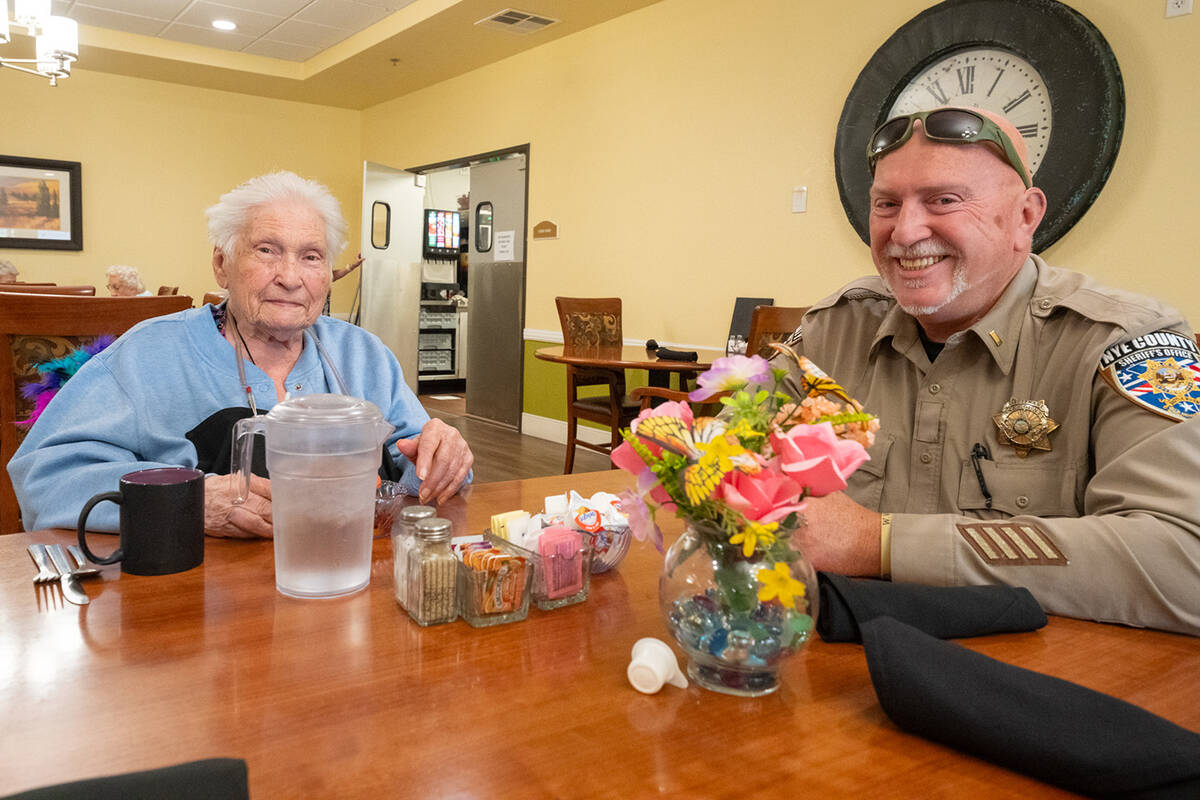 Lt. William Gray (right) smiles for a picture at the Inspirations Senior Living breakfast with ...