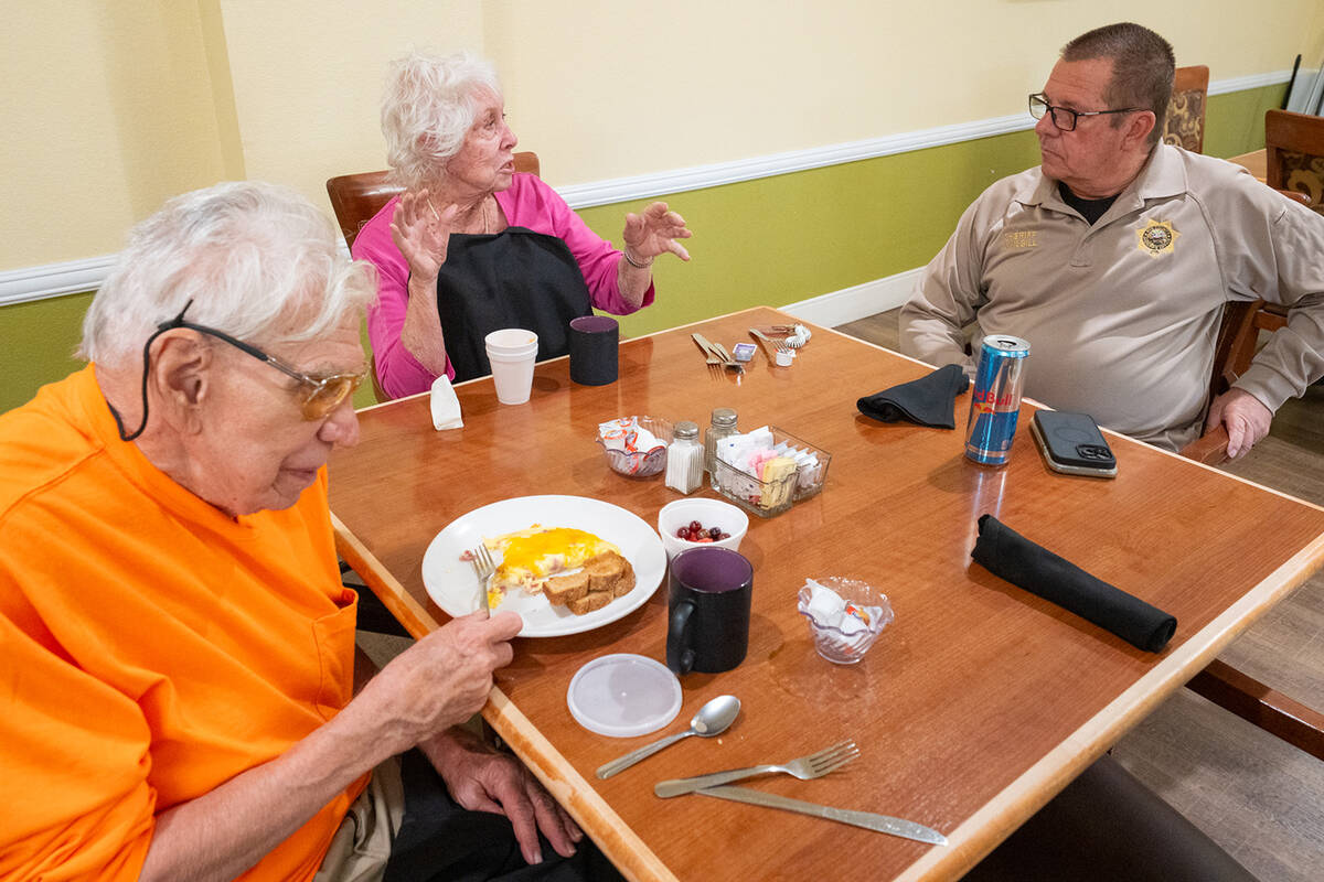 Nye County Sheriff Joe McGill (right) chats with residents at Inspirations Senior Living on Aug ...