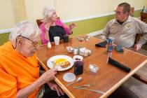 Nye County Sheriff Joe McGill (right) chats with residents at Inspirations Senior Living on Aug ...