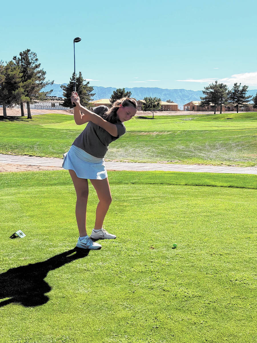 Pahrump Valley sophomore Raegan Saldana swings from the tee box during the Trojans’ Aug. 20 m ...