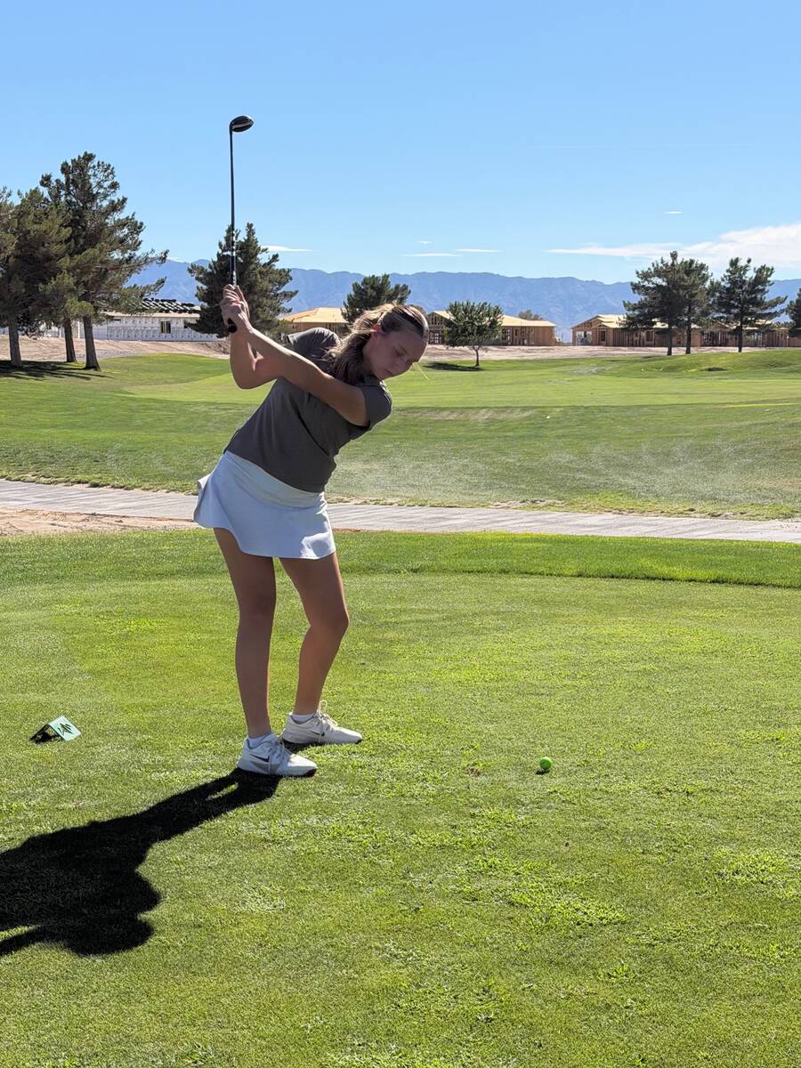 Pahrump Valley sophomore Raegan Saldana swings from the tee box during the Trojans’ Aug. 20 m ...