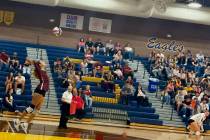 Pahrump Valley senior Riley Saldana sends a serve toward Boulder City during the Trojans’ str ...