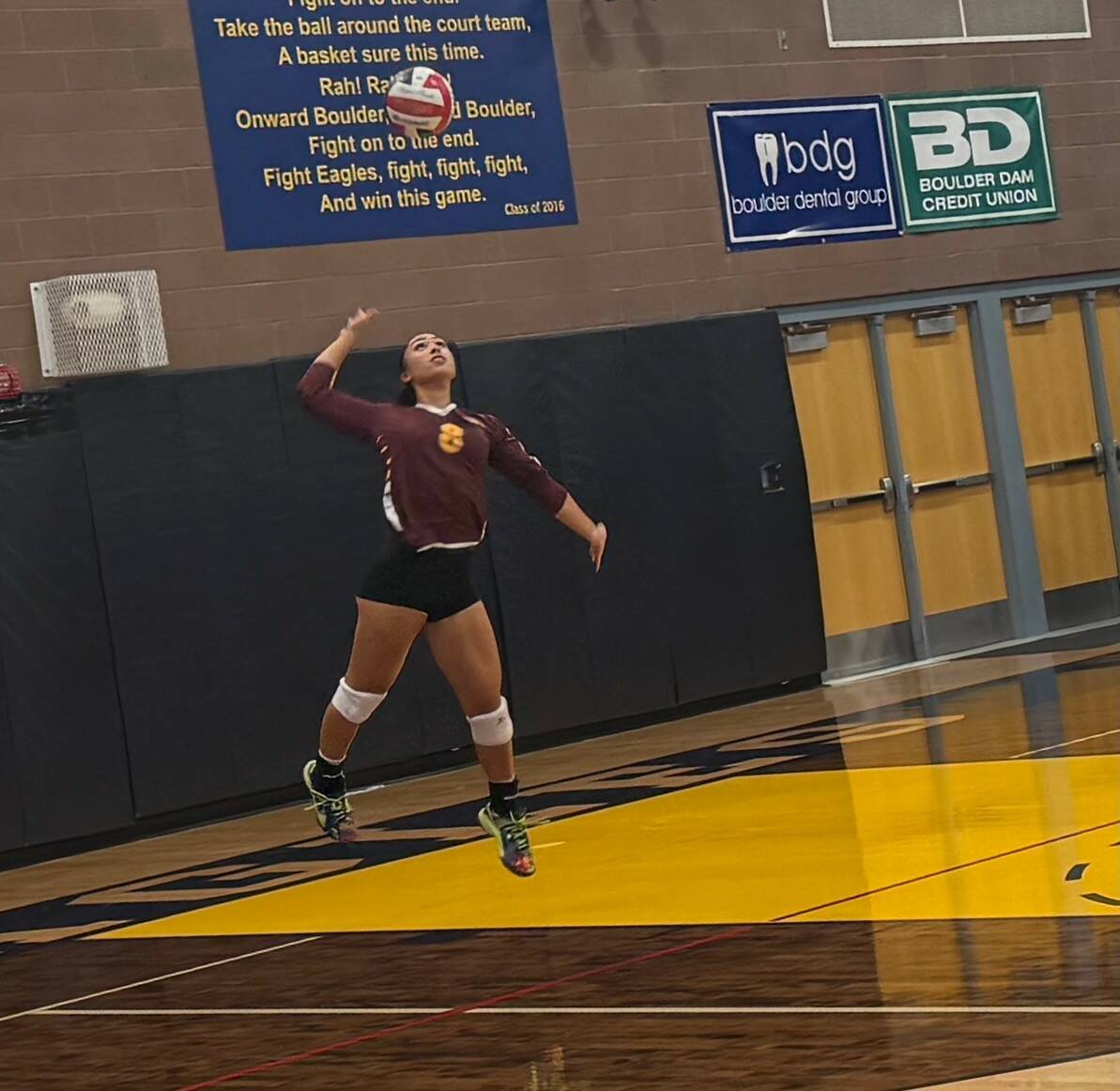 Pahrump Valley’s Xe’ane Kamanu prepares to serve during the Trojans’ three-set victory at ...