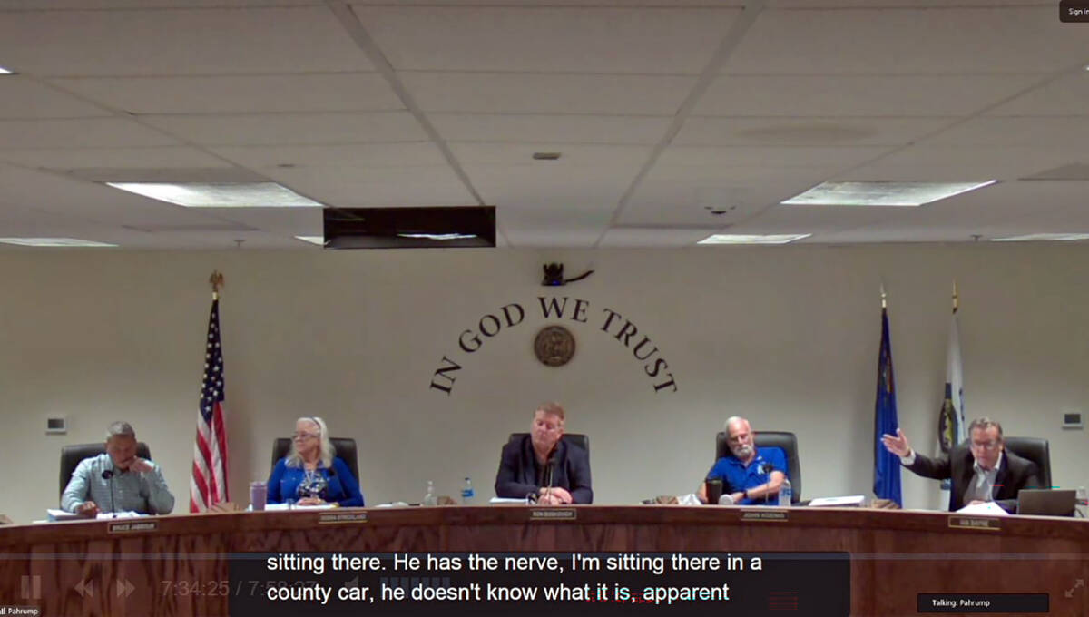 Nye County Commissioner Ian Bayne, far right, speaks at the board's Tuesday, Sept. 15 meeting, ...