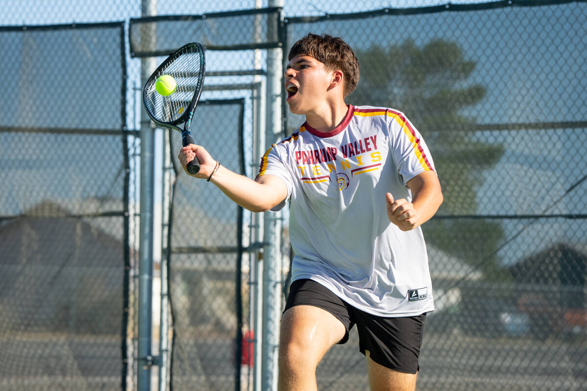 Pahrump Valley senior Tristan Torres meets the ball during a doubles match against Moapa Valley ...