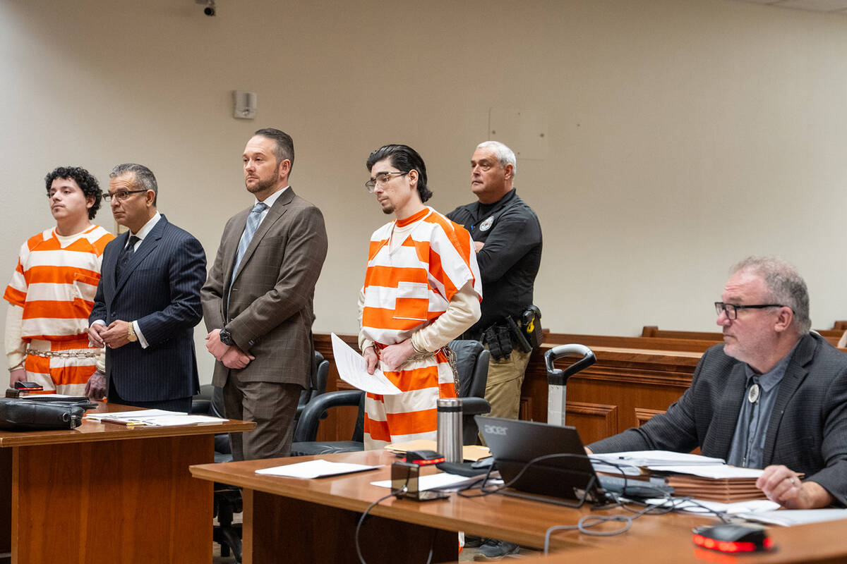 (From left to right) Anthony Aguilar, attorney Christopher R. Oram, attorney Michael A. Troiano ...