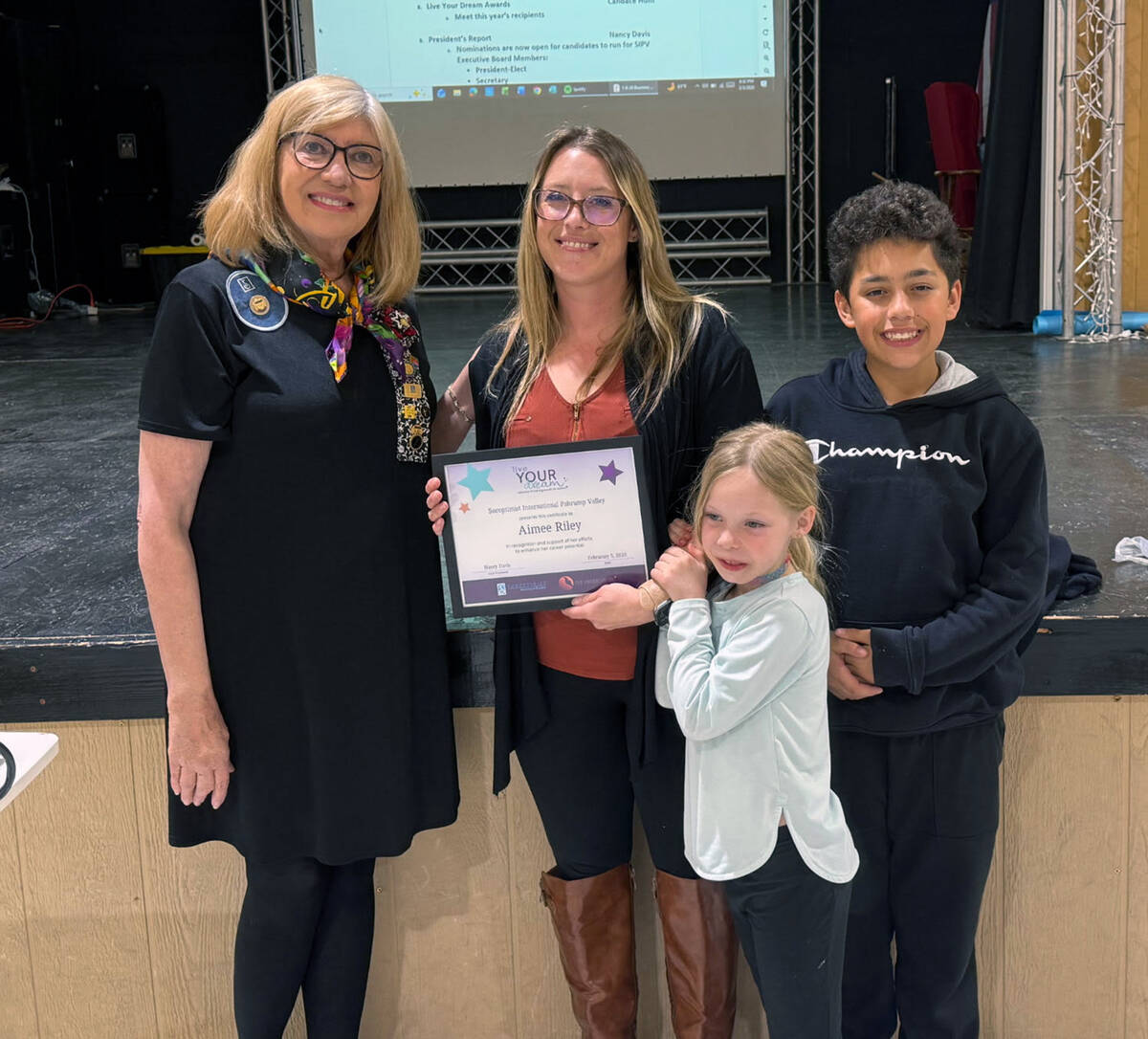 Pahrump Soroptimist Nancy Davis poses with Live Your Dream Award recipient Aimee Riley and her ...