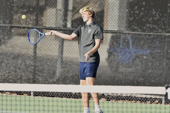 Robert Vendettoli/Boulder City Review Returning the ball, Boulder City doubles star Miles Alder ...