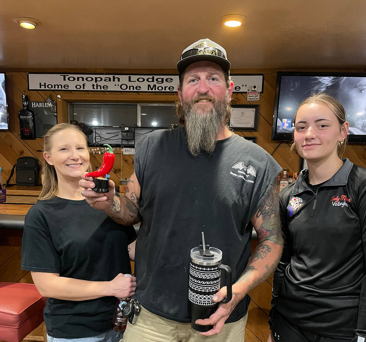 Tonopah High School volleyball player Rylie Stringer, right, poses with Adam Thomas, who won fi ...